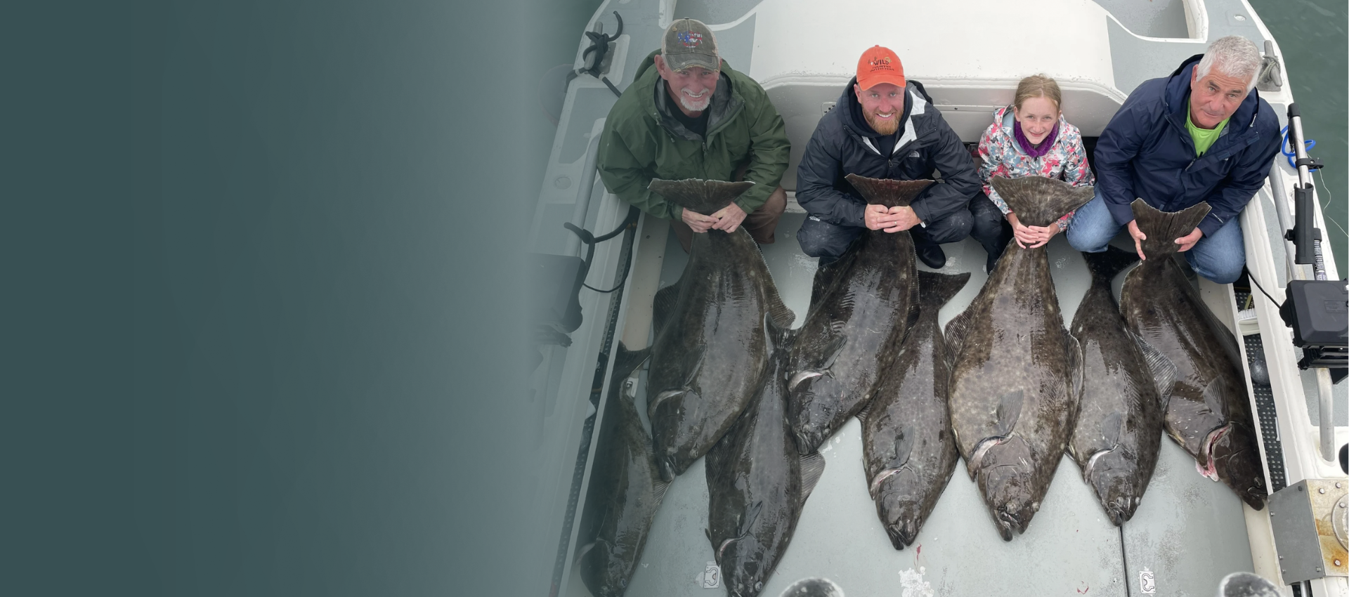 Guided anglers with Pacific halibut aboard an Alaska charter vessel